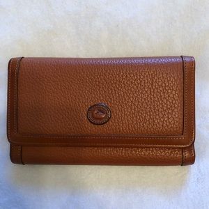 Dooney and Bourke tan leather wallet.